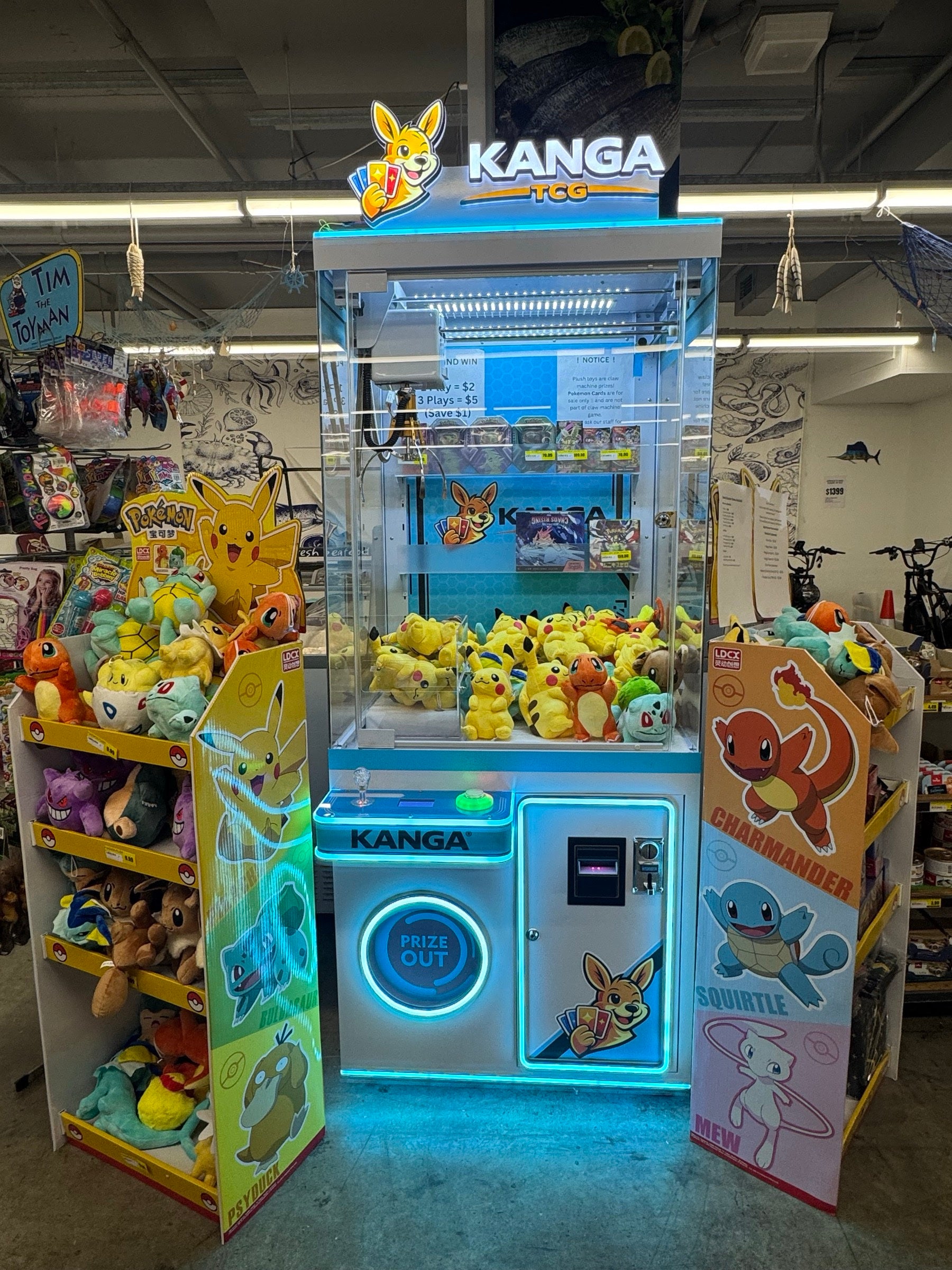 The KANGA TCG claw machine filled with Pokémon plush toys